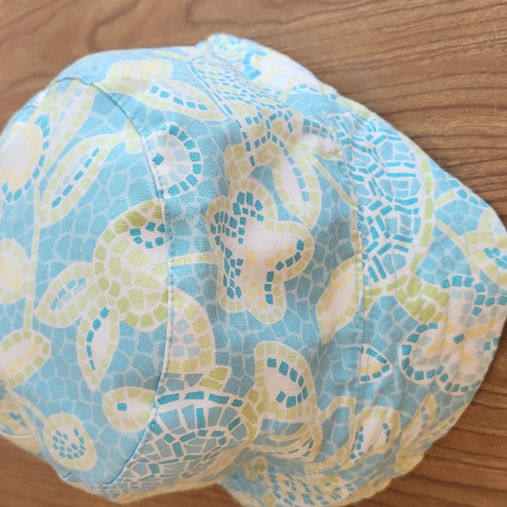 Reversible sun hat. I think it is a Talbot brand but not positive.
